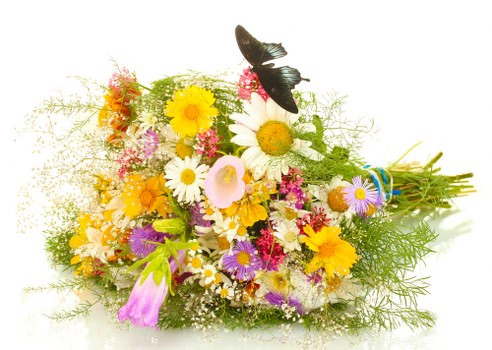 Delivery person handing over a vibrant floral bouquet